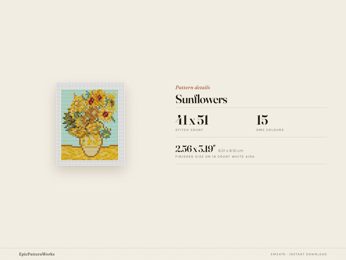 Cross stitch pattern of a vase filled with golden sunflowers on a yellow tabletop against a light blue background, stitched on white aida fabric.